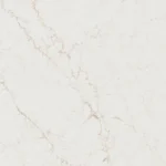 Caesarstone ICON 5144 Rossa Nova White marble surface with subtle gray and gold veining patterns.